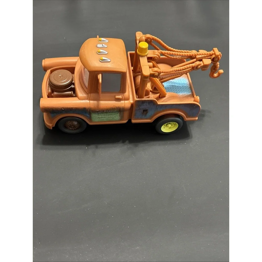 Disney Pixar Cars Lot - Mack Transforming Playset Hauler & Moving Moments Mater